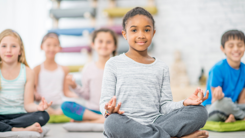 Kids doing yoga poses